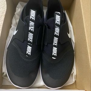 Kids Nike sneakers. Very comfortable.